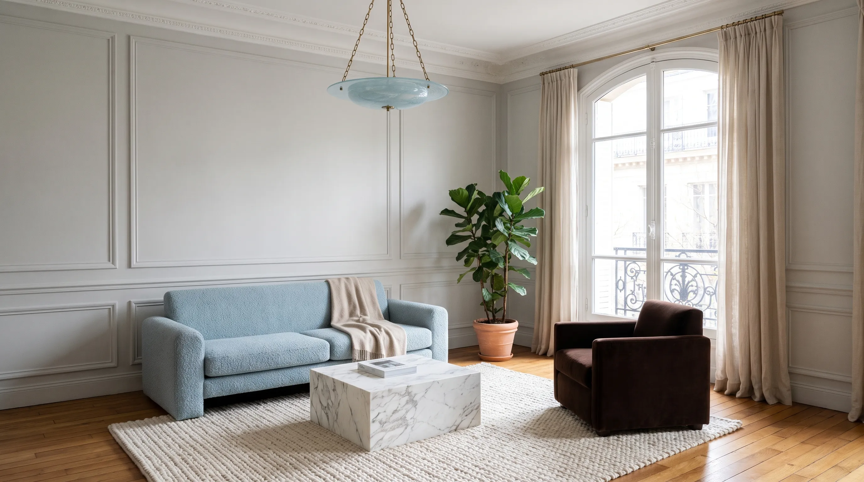 Bright living room with a large, freshly cleaned window and clean furniture